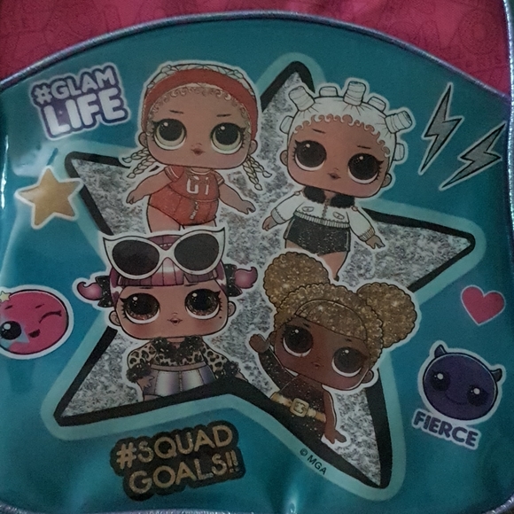 I'm selling a lol bag and a toy and books - Picture 2 of 4